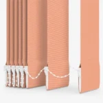 Close-up of peach vertical blind slats and bottom chain