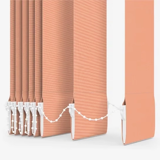 Close-up of peach vertical blind slats and bottom chain