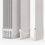 Close-up of vertical blind slats with white weights