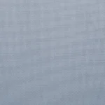 high-detail close-up of the denim blue fabric's woven texture.